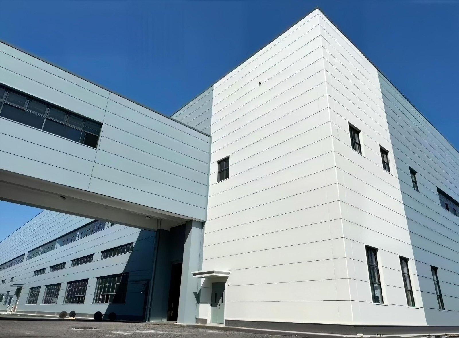 Factory exterior with PU edge-sealed rock wool panels after 3 years tropical exposure